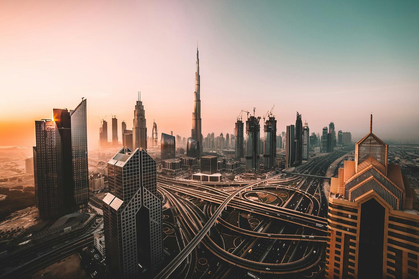 Downtown Dubai skyline with the Burj Khalifa at sunrise